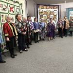 Models for the Wearable Fashion Show during the Sunbonnet Sue Quilt Clubs 40th anniversary stand for a photo at the Sequim Masonic Lodge after they walked through the crowd and showed off their outfits. (Matthew Nash/Olympic Peninsula News Group)