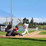 Port Angeles Bryce DeLeon hits a two-run double against Orting. (Pierre LaBossiere/Peninsula Daily News)