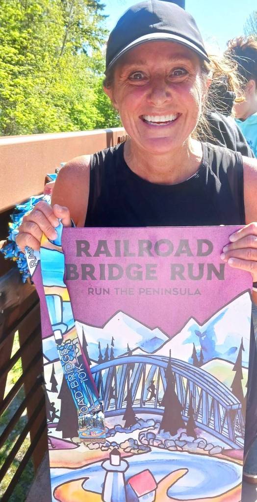 Jennifer Mathews of Belfair won the womens 10K at the Sequim Railroad Bridge run. (Pierre LaBossiere/Peninsula Daily News)
