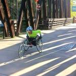 Addie Killam of Burien did the Sequim Railroad Bridge Run in her wheelchair, finishing in 44:41.1, the fifth-best time of the race. (Pierre LaBossiere/Peninsula Daily News)
