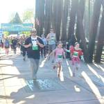One of the dozen or so staggered starts at the Sequim Railroad Bridge run. Staggered starts were used to limit the number of people on the bridge all at once. (Pierre LaBossiere/Peninsula Daily News)