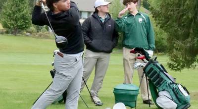 Sequims Adrian Aragon and Port Angeles Max Gagnon and Sky Gelder at the seventh tee at Peninsula Golf Club on Tuesday in the Duke Streeter Invitational. (Dave Logan/for Peninsula Daily News)