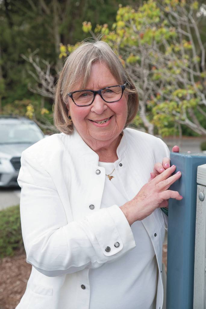 Jean Heessels-Petit, historian for the Sequim Bay Yacht Club, has been going through past issues of the clubs newsletter The Scuttlebutt, and other sources, including past members, to compile histories of the clubs 50 years in Sequim and on the water. (Emily Matthiessen/for Olympic Peninsula News Group)