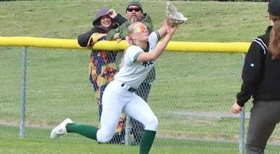 Port Angeles Mariah Traband tracks down a fly ball in right field. Traband went 4-for-4 as the No. 3-ranked Roughriders beat North Kitsap 13-3 to win the Olympic League championship. (Dave Logan/for Peninsula Daily News)