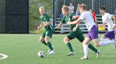 Port Angeles Matthew Miller, left and Tanner Lagrange, force the issue against North Kitsaps defense Tuesday at Wally Sigmar Field at Peninsula College. (Dave Logan/for Peninsula Daily News)