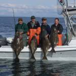 State Department of Fish and Wildlife
Halibut anglers display their catch during a fishing outing.