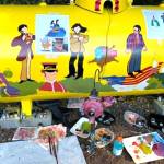 Using a CD insert, the movie and online screenshots, Monika Livingstone, a former mural artist, painted her homes propane tank following the Yellow Submarine animated film. (Monika Livingstone/Olympic Peninsula News Group)
