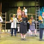 Matthew Nash/Olympic Peninsula News Group
Actors with Urinetown the Musical rehearse the song Mr. Cladwell. They include, from front left, Charlie Medlong (as McQueen), Nikki Forrest (Dr. Billeaux), Rebecca Maberry (Ms. Millennium), Fey Beeson (Secretary), Joodie Klinke (Senator Fipp), and, top left, Sunshine Peterson (Hope) and Ron Graham (Caldwell B. Cladwell).