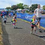 Kindergartners take off at the starting line in Saturdays NODM Kids Marathon (Pierre LaBossiere/Peninsula Daily News)