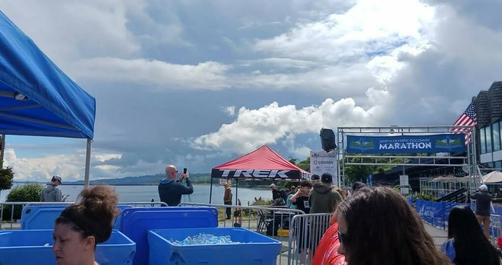 Heavy clouds hovered beyond the start/finish line at the NODM 5K/10K on Saturday morning, but rains never did come. (Pierre LaBossiere/Peninsula Daily News)