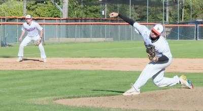 Pitcher Brady Prague delivers to the plate against Bellingham at Civic Field on Tuesday. Port Angeles pitchers allowed just two earned runs but were hurt by six unearned runs in an 8-1 loss. Playing third base for the Lefties is Kaleb Campbell. (Dave Logan/for Peninsula Daily News)