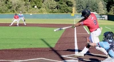 Wilder Seniors Hunter Tennell hits one of his two doubles against the Kitsap Rebels on Tuesday at Volunteer Field. He also hit a home run for six total RBIs. (Dave Logan/for Peninsula Daily News)