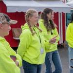 Kendall Adolphe, second from left, gestures as she delegates tasks to fellow teens, from left, Levi Adolphe, Addison Adams and Trinity McNorris during a recent Saturday food distribution at Sequim Food Bank. (Emily Matthiessen/Olympic Peninsula News Group)