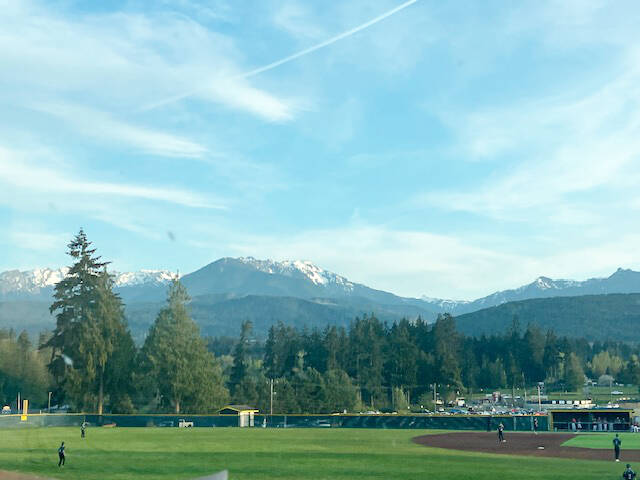Local youth play baseball on a Peninsula field. (Minnie Whalen)