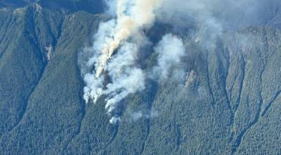 A lightning-caused fire is burning about 5 miles west of Mount Olympus in Olympic National Park.