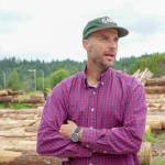 Cody Wayland, owner/member of Jefferson Timber Cooperative on state Highway 20 near Port Townsend, speaks about the operations of the lumberyard. (Steve Mullensky/for Peninsula Daily News)