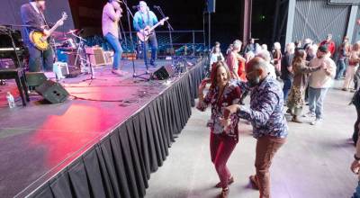 Damon and Kelsy Lynn Stone, foreground, dance at Fort Worden State Parks McCurdy Pavilion in 2025. The pair will teach a four-day blues dance track as part of Centrums Traditional Blues Workshop during the last week of July. (David Conklin)