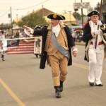 Vern Frykholm, dressed as George Washington, walks in the Sequim Irrigation Festival Grand Parade this year with The New Dungeness Chapter of the Daughters of the American Revolution (DAR) and others. Hes portrayed Washington for 14 years and has found many memorable moments and encounters. (Matthew Nash/Olympic Peninsula News Group)