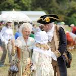 Jane Ritchey and Vern Frykholm as Martha and George Washington greet visitors at the Northwest Colonial Festival in Agnew. Frykholm has gone on to appear at hundreds of events and classrooms through his nonprofit George Washington Speaks. (Olympic Peninsula News Group file)