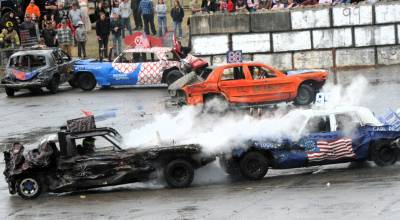 Head on collisions were many during the annual Demolition Derby held Saturday at the Tillicum Park Arena in Forks during the Fourth of July celebration. A large crowd turned out to witness cars being smashed all over the Forks arena. (Lonnie Archibald/For Peninsula Daily News)