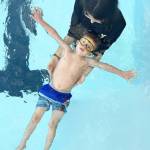 Lifeguard and swim instructor Savannah Minker teaches level 1/2 swim lesson skills to 4-year-old Makennon Wheeler.(Olympic Peninsula YMCA)