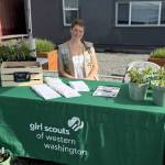 As part of one of three events for her Girl Scout Gold Award project, Skylar Krzyworz provided 100 one-pot gardens, 200 low-cost recipe books, seed packets and plant starts at the Sequim Food Bank last summer. (Skylar Krzyworz)