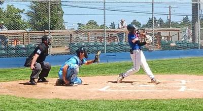 The Lefties Garrett Patterson belts a first-inning single Sunday against Edmonton at Civic Field. (Pierre LaBossiere/Peninsula Daily News)