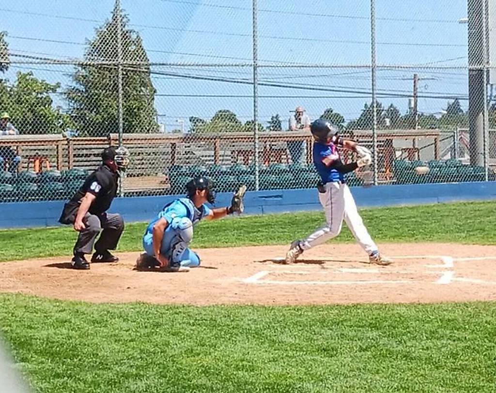 The Lefties Garrett Patterson belts a first-inning single Sunday against Edmonton at Civic Field. (Pierre LaBossiere/Peninsula Daily News)
