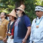 Wade Greene, left, Randy Eastman Jr., Mike Ward and Randy Jackson Jr. sing a blessing song Thursday at the NatureBridge Campus. (Emily Hanson/Peninsula Daily News)
