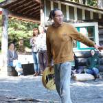 Wade Greene speaks Thursday about canoes that were carved at the NatureBridge Campus. (Emily Hanson/Peninsula Daily News)