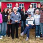 Members of the Dick and Hunt families were honored by the North Olympic Land Trust on July 26 for The Dick Family Farms legacy over the last 100-plus years. It continues to be a working farm today. The Land Trust purchased the property with the intent to keep it as farmland indefinitely. (Monica Berkseth/for Olympic Peninsula News Group)
