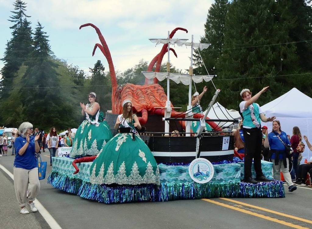 The Sequim Irrigation Festival Float, with royalty, in the Joyce Daze parade. (Dave Logan/for Peninsula Daily News)